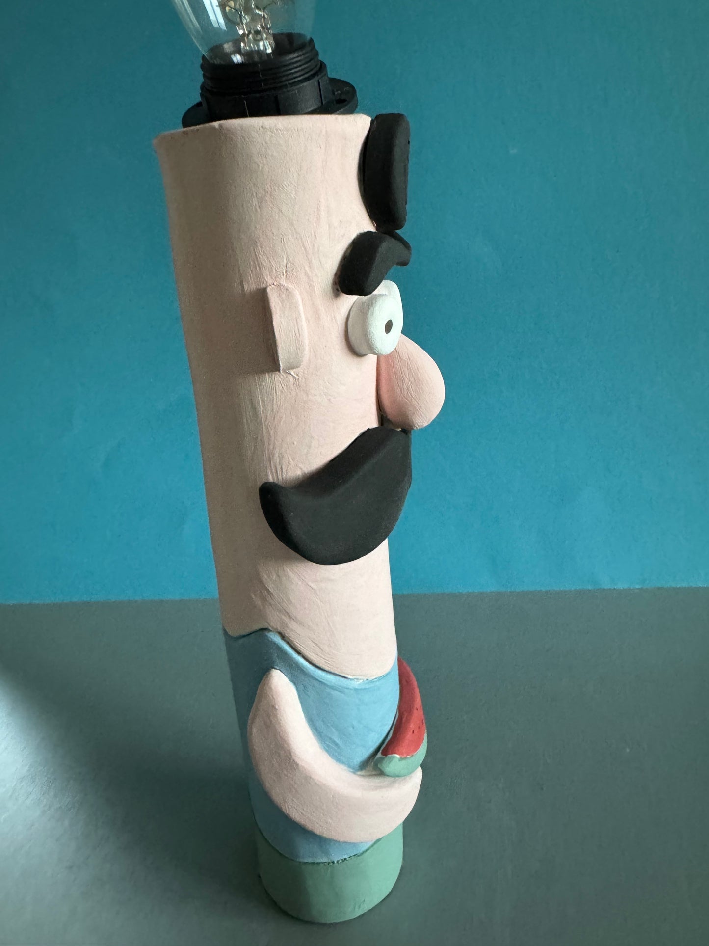 Ceramic Beach Guy Lamp