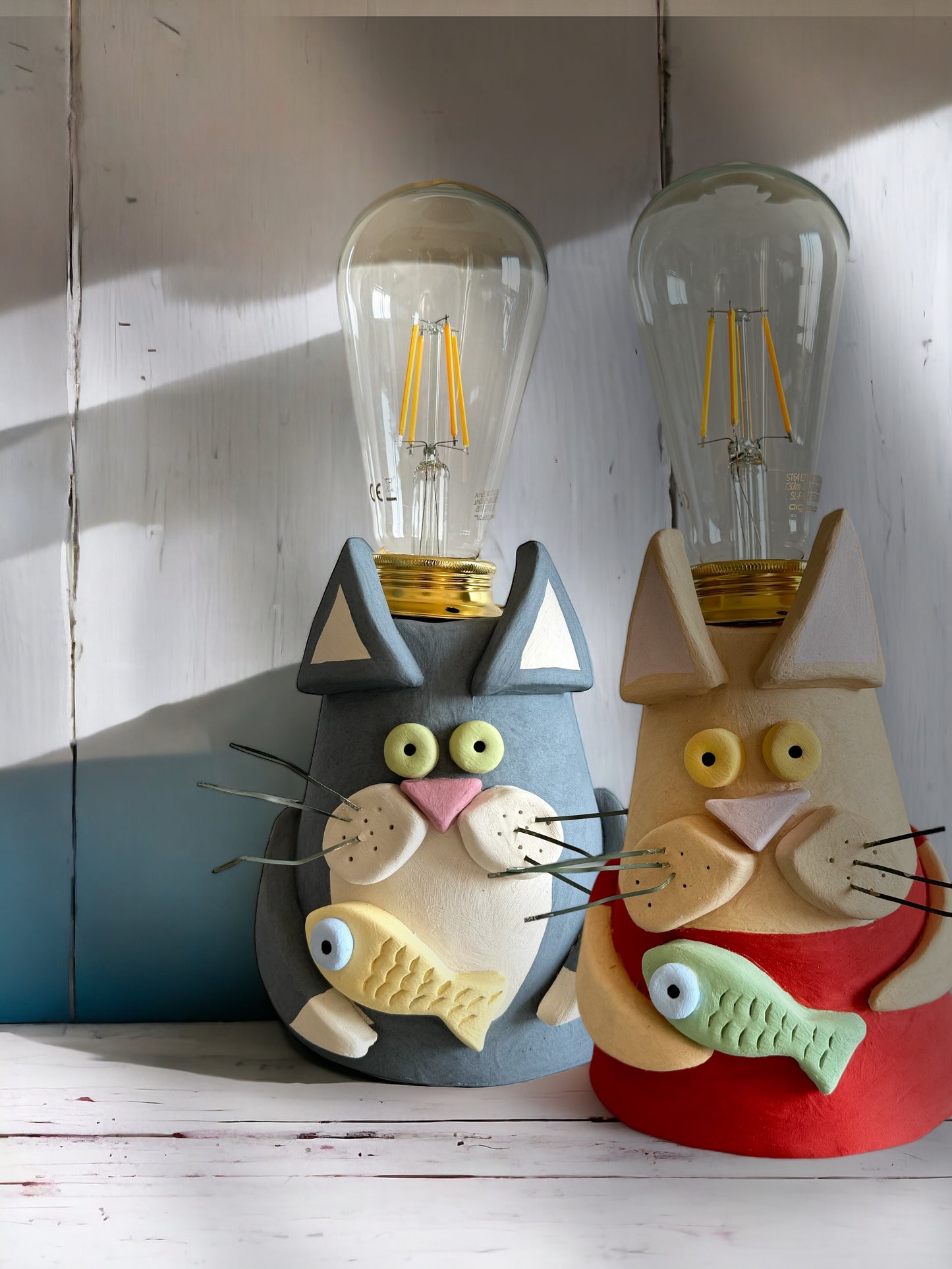 Lampada per gatti in ceramica